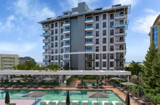 Просторная квартира в жилом комплексе в центре Алании (34500)