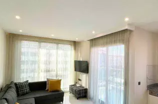 Современная квартира в роскошном комплексе в живописном районе Каргыджак (0140001)