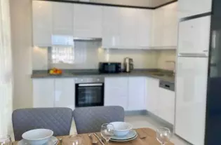 Просторная квартира в аренду в 300 метрах от моря в Махмутларе (0070001)