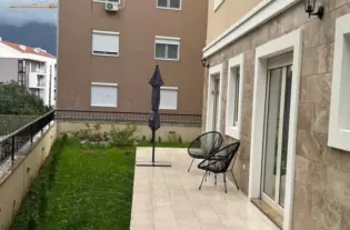 Квартира с тремя спальнями в Тивате