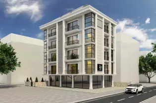 Современные квартиры в небольшом жилом комплексе на стадии строительства в центре Алании (028121)