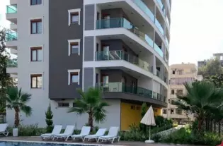 Современная квартира 1+1 от инвестора в жилом комплексе в Махмутларе (09100)