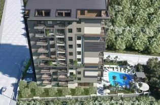 Комплекс апартаментов - инвестиционный проект у моря в сердце Махмутлара (037398)