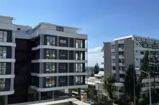 Элитная квартира у моря в районе Каргыджак с собственным пляжем (0300001)