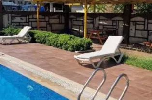 Современная квартира в центре Махмутлара с панорамным видом на горы (0520001)